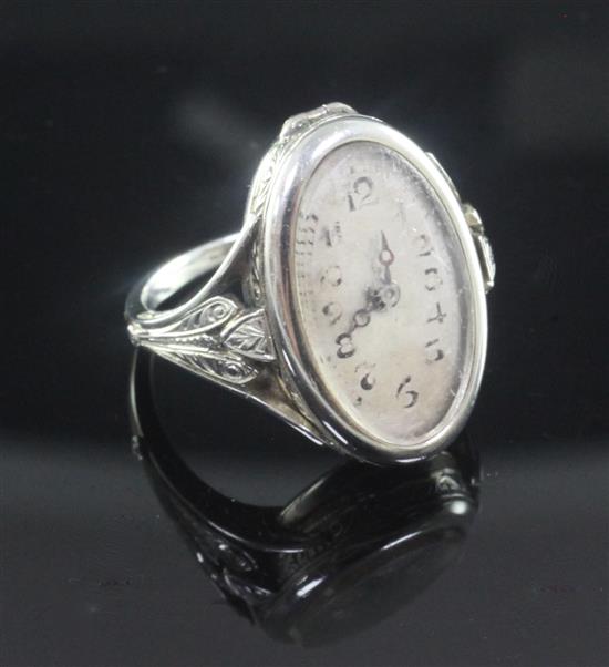 An 18ct white gold ring watch, size L.